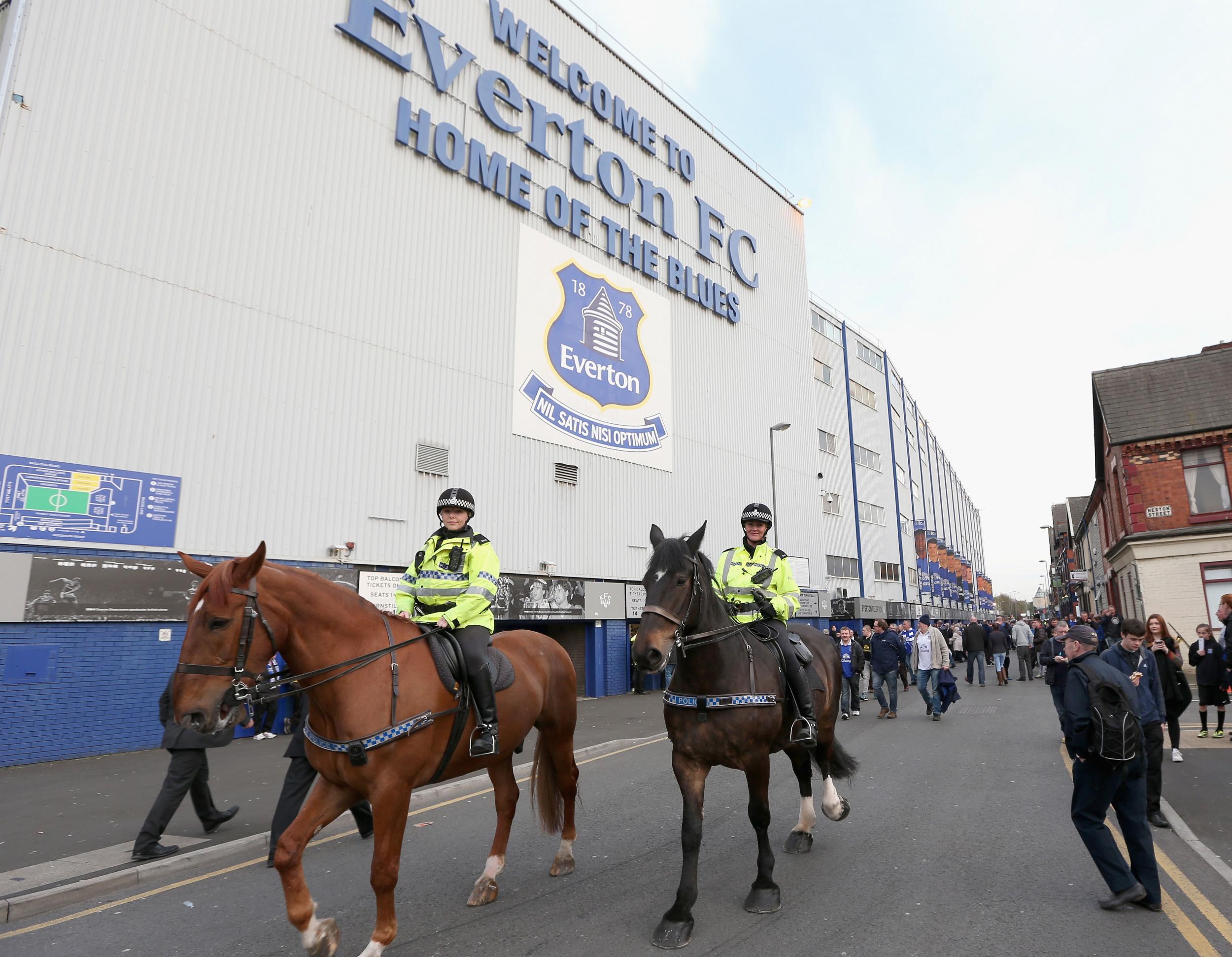 Mounted Merseyside Police officers patrol outside Goodison Park
