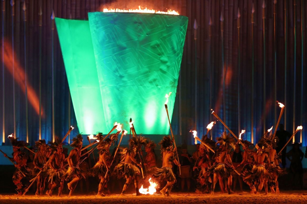 Brazil's Terena indigenous people perform the dance of the sacred fire during the closing ceremony (AP)