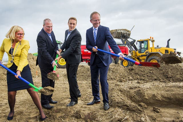 Googlers pose at a building site in the Netherlands, where the company is building a huge new data centre — much of which will be powered by the work of George Boole