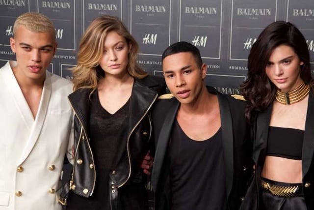 Olivier's army: (clockwise from left) Rousteing with Gigi Hadid on his right, Kendall Jenner on his left, and a model lookalike