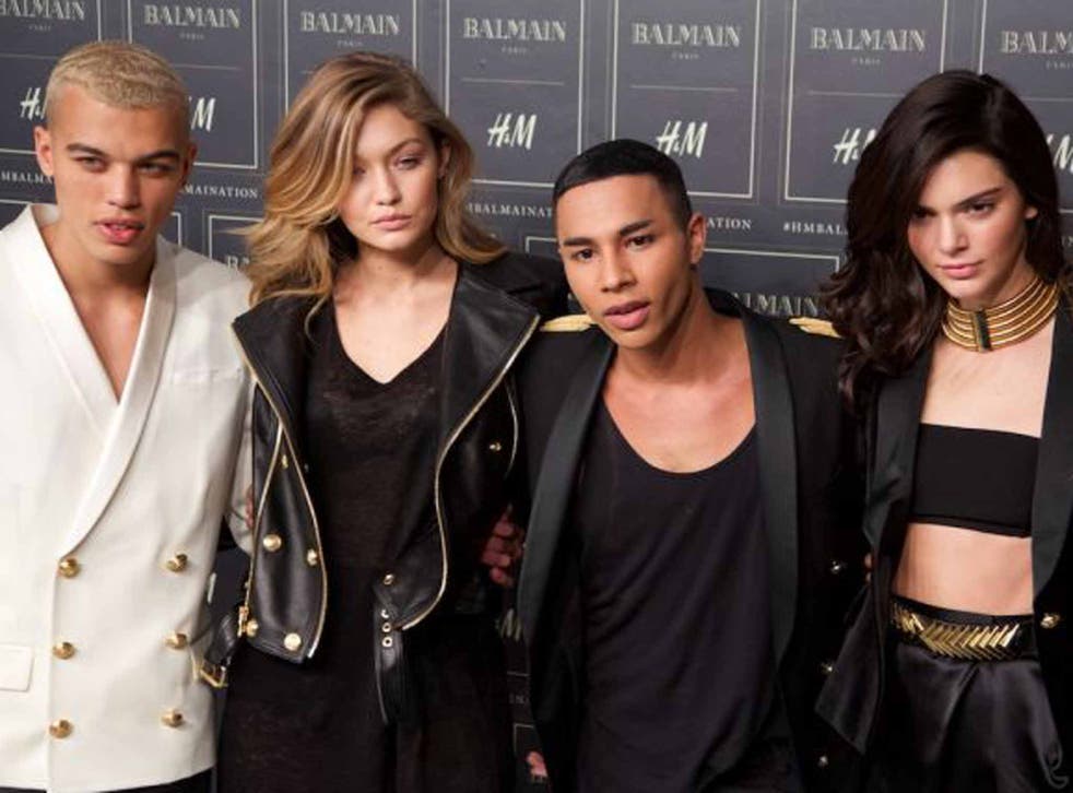 Olivier's army: (clockwise from left) Rousteing with Gigi Hadid on his right, Kendall Jenner on his left, and a model lookalike