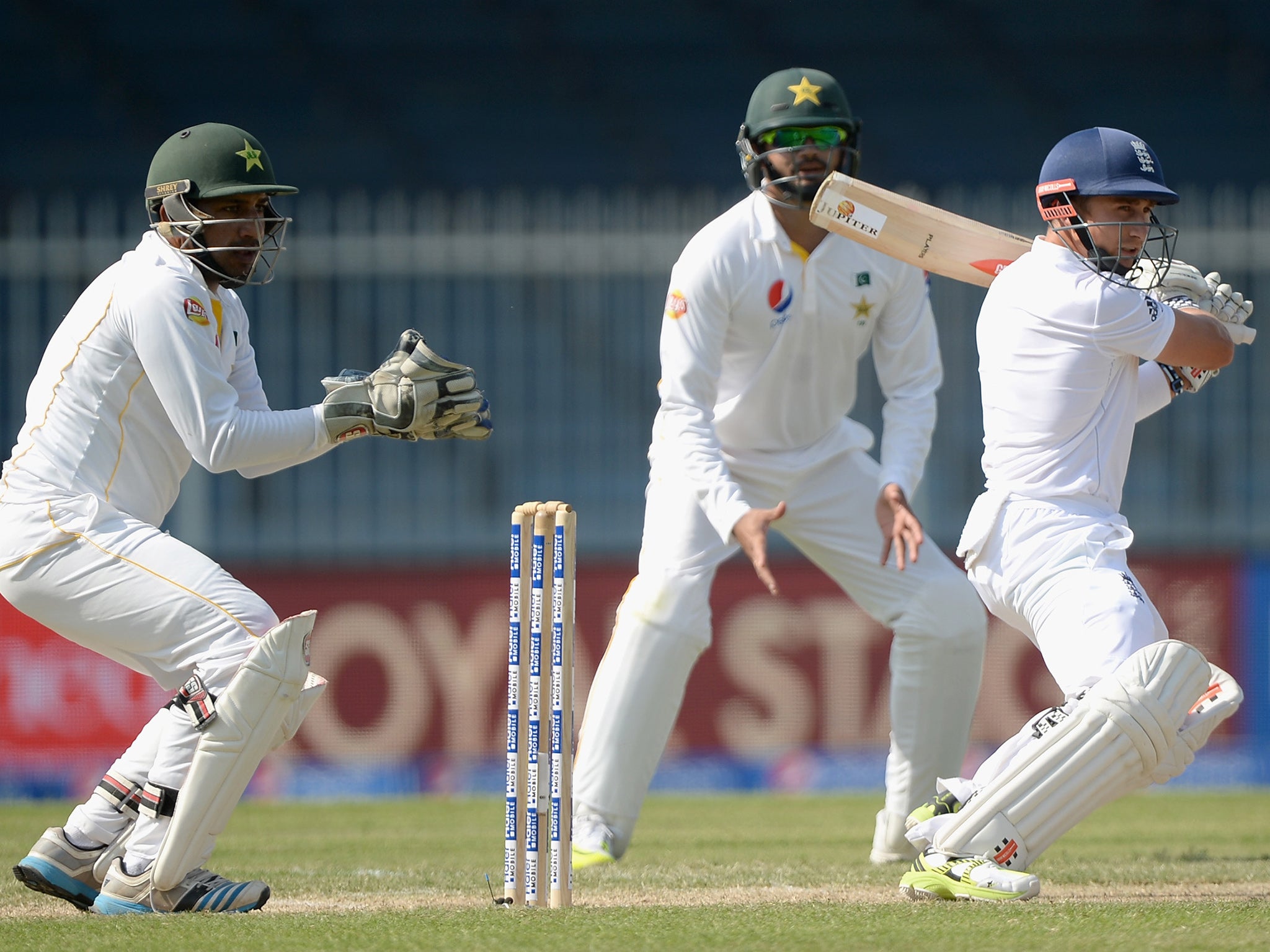 James Taylor (right) plays a shot against Pakistan
