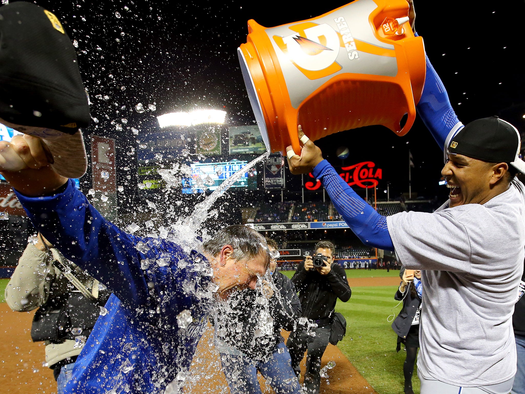 &#13;
MVP Salvador Perez pours liquid over Royals manager Ned Youst&#13;