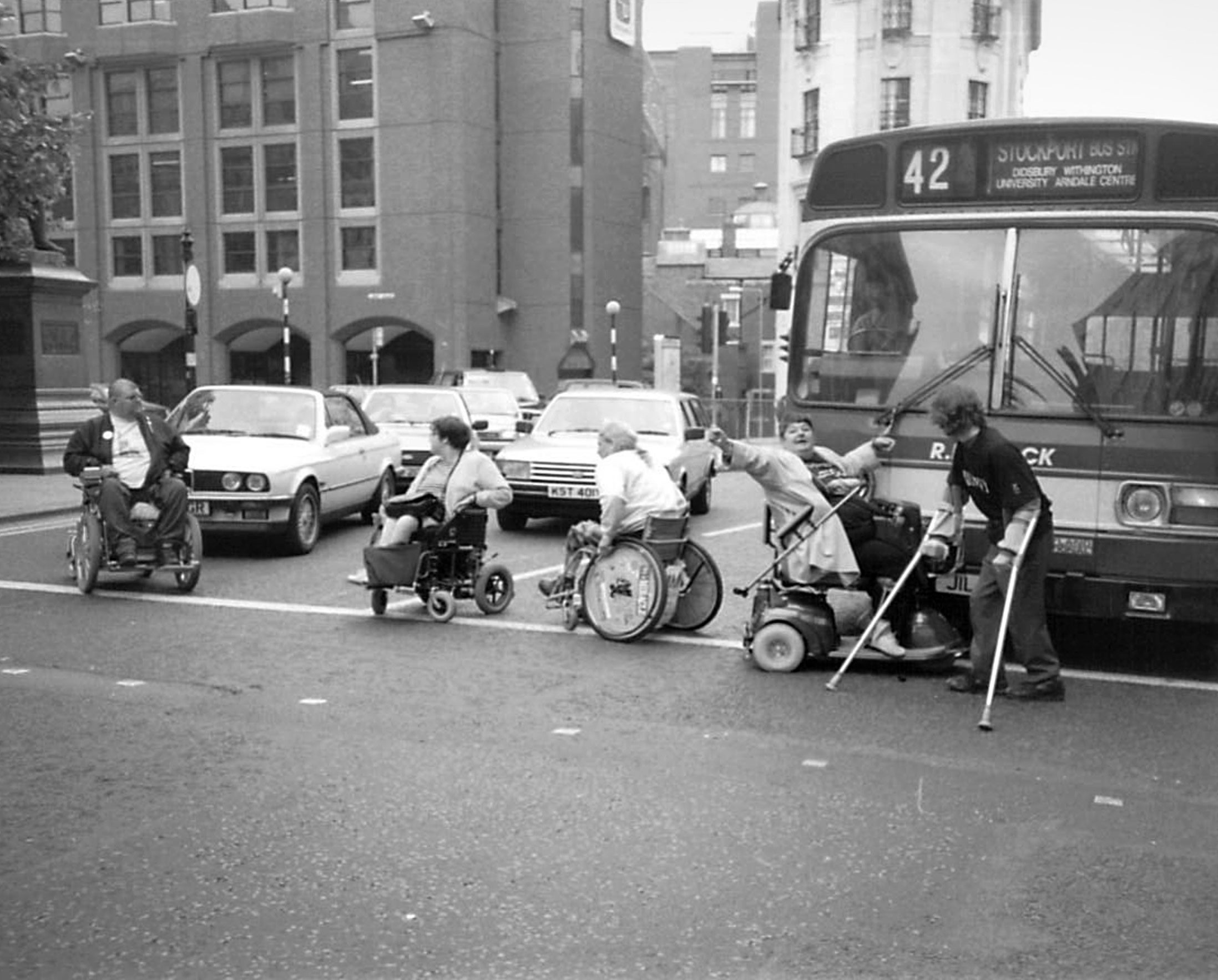 Disabled people taking part in a direct action protest against discrimination in the early 1990s