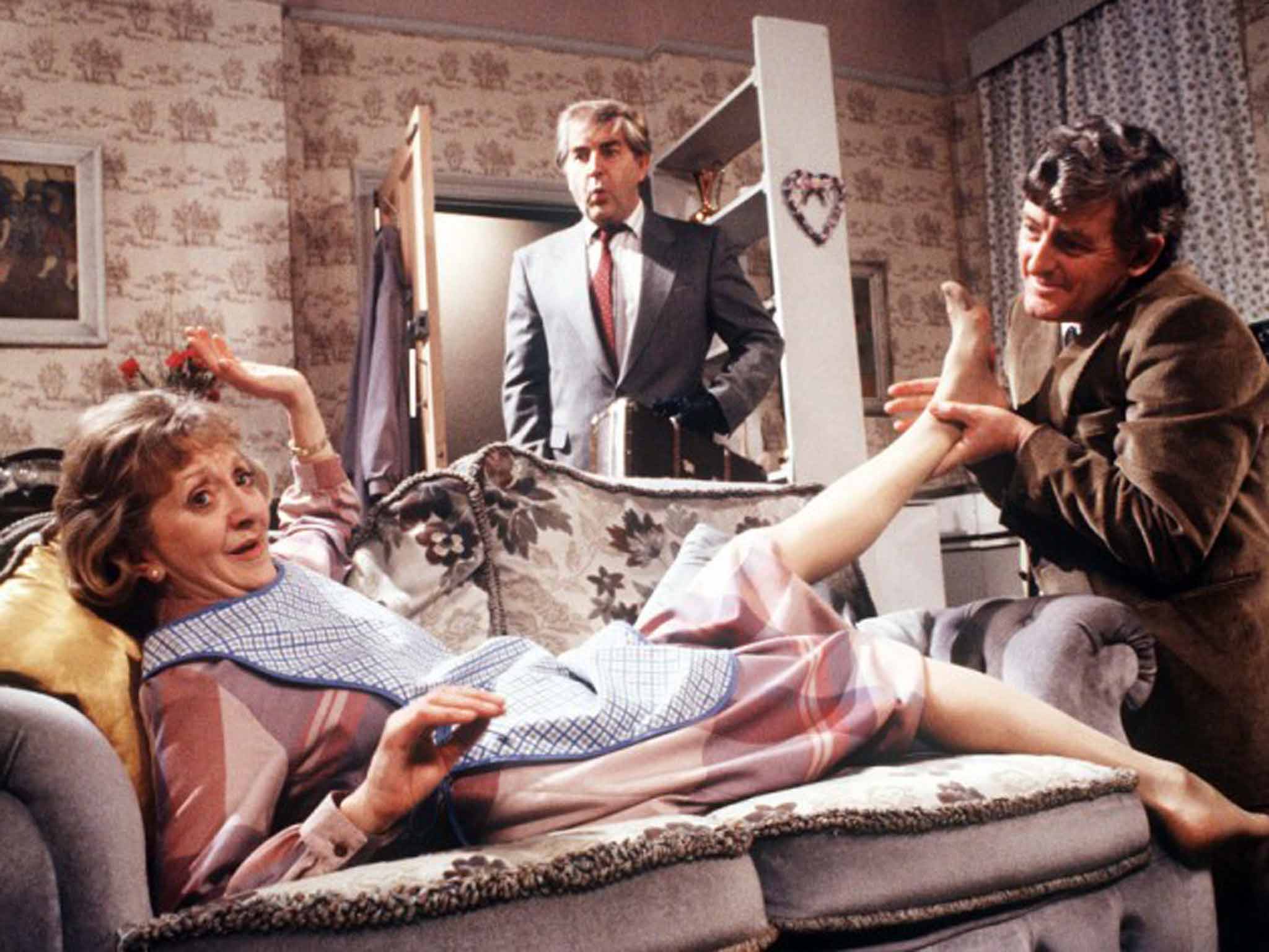'Jezebel!': Baldwin's Derek, centre, catches Mavis getting a foot massage from her old flame, Victor