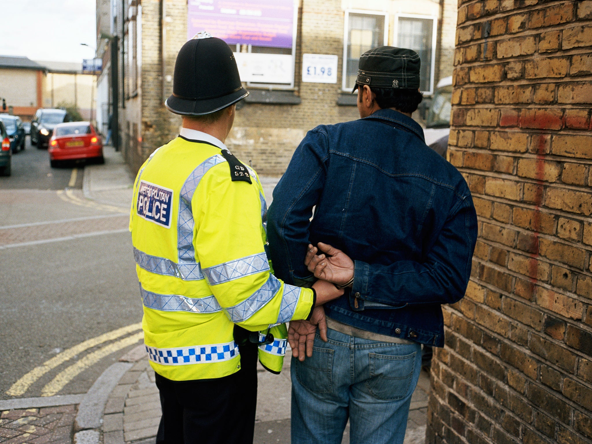 Leading police commissioners are considering suing the Government over slashed budgets for frontline services