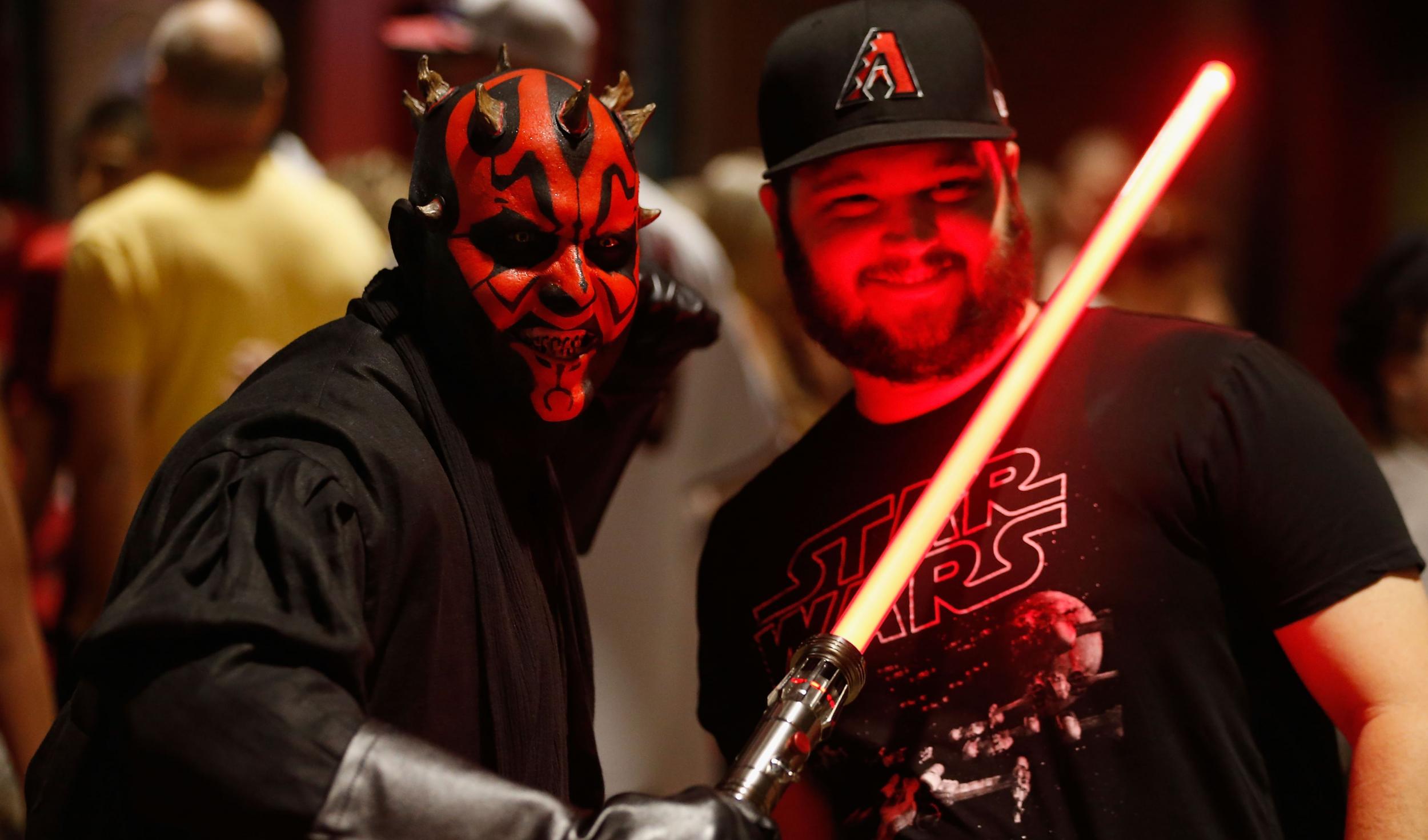 Star Wars themed fans mingle the concourse in honor of the franchise