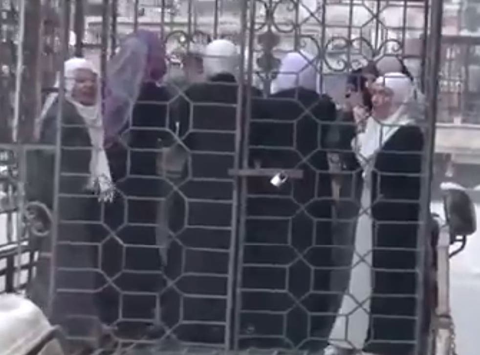 Footage of Alawite men and women being paraded through the streets of Damascus has emerged