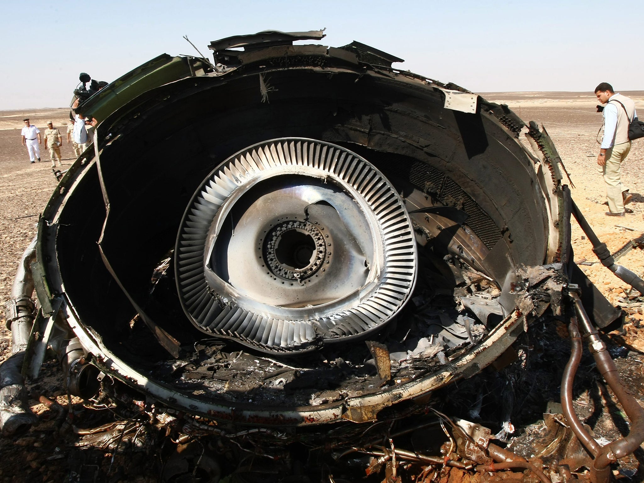 A piece of an engine of Russian MetroJet Airbus A321 at the site of the crash in Sinai,