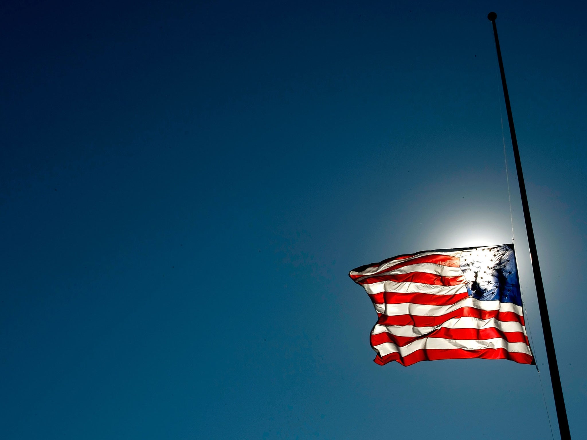 Children chanting the national anthem under the American flag isn't always admirable