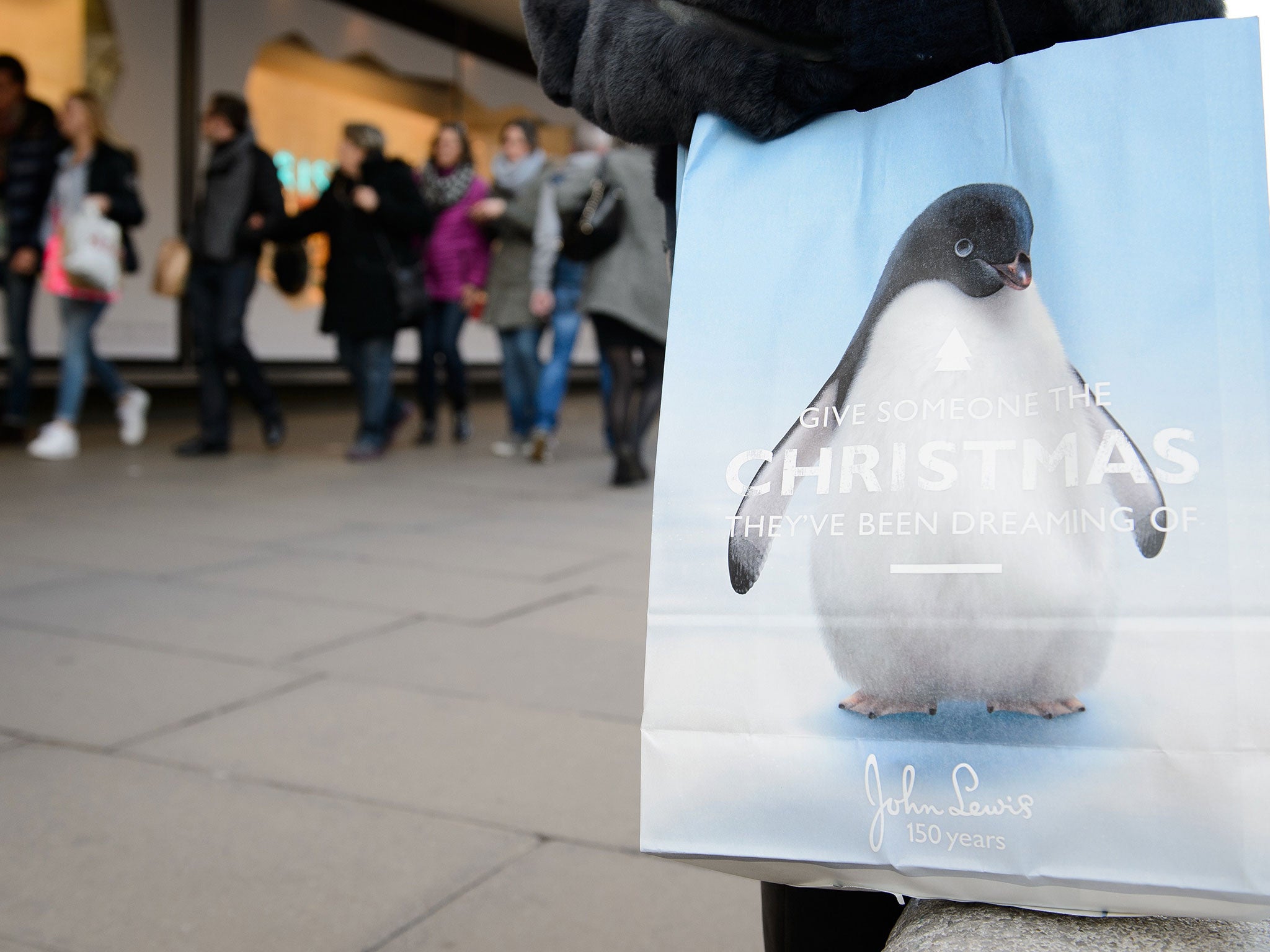 As Christmas nears, British television screens are filled with heart-warming tales of lonely penguins, family reunions and homesick soldiers in an attempt to get customers to part with their cash.