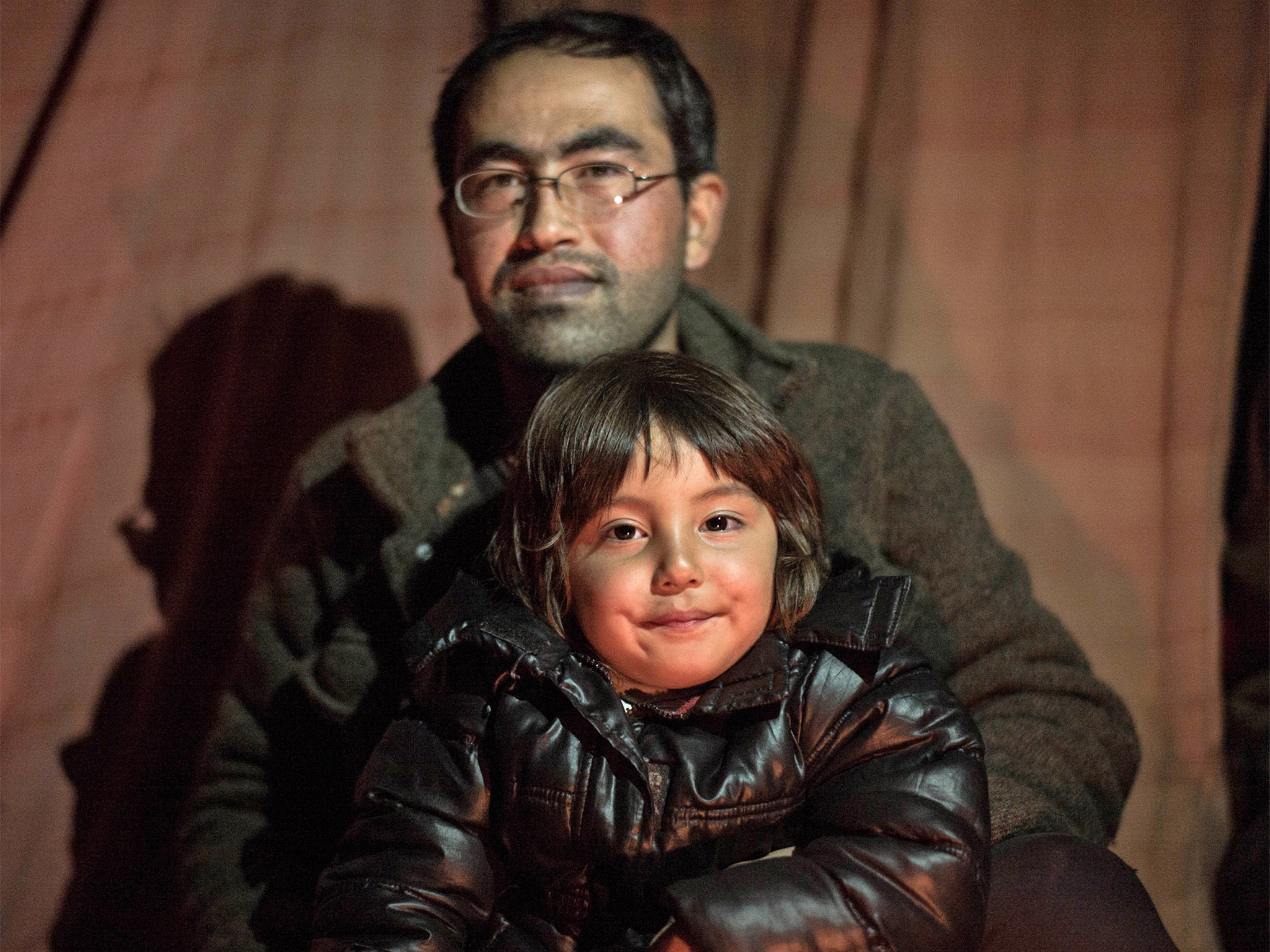 Bahar Ahmadi, 4, who is still living with her father, Reza, in the refugee camp in Calais