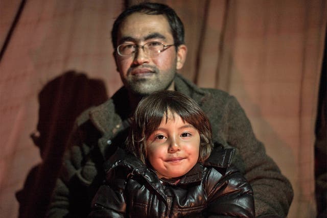 Bahar Ahmadi, 4, who is still living with her father, Reza, in the refugee camp in Calais