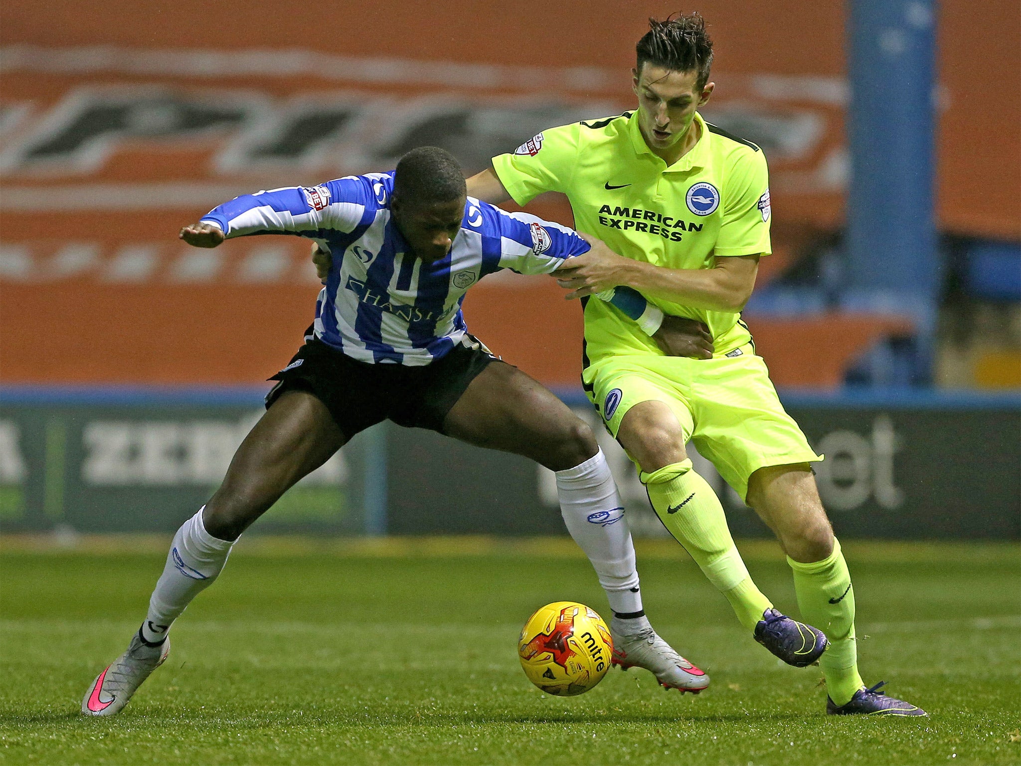 Lucas Joao, of Sheffield Wednesday, tussles with Brighton’s Lewis Dunk during the goalless draw at Hillsborough