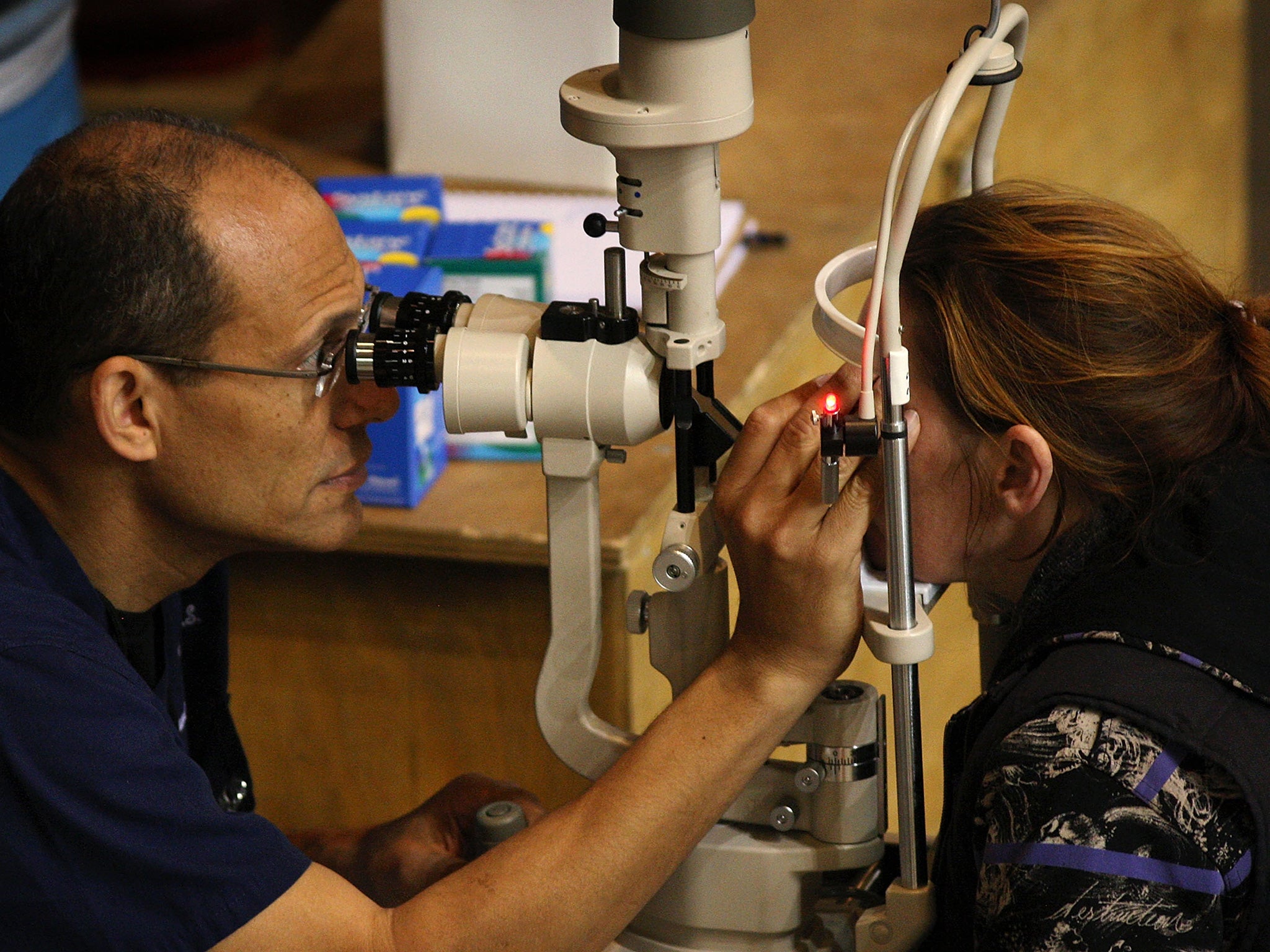 An optometrist at work