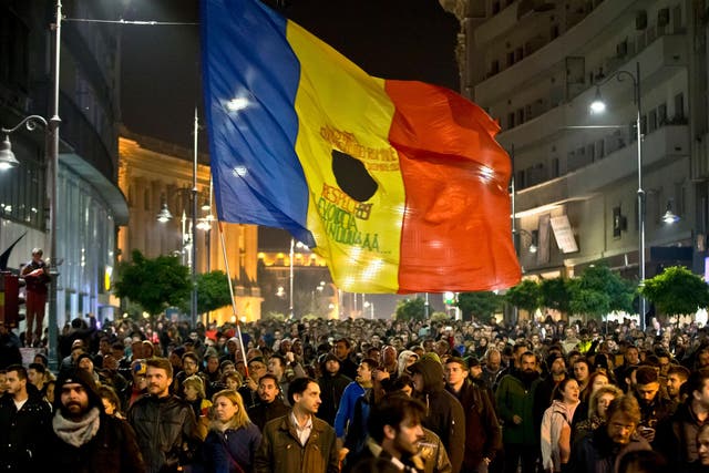 Romanians fill the Calea Victoriei, a main avenue of the Romanian capital, during a large protest in Bucharest, Romania on Tuesday