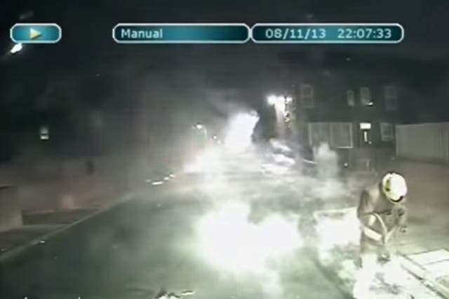 Video shows teenagers shoot fireworks at a fireman while he extinguishes flames
