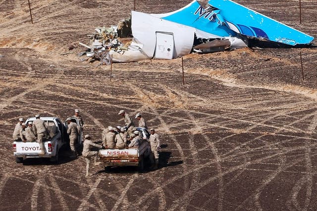 A handout picture taken on November 1, 2015 and released on November 3, 2015 by Russia's Emergency Ministry shows the wreckage of a A321 Russian airliner in Wadi al-Zolomat, a mountainous area of Egypt's Sinai Peninsula