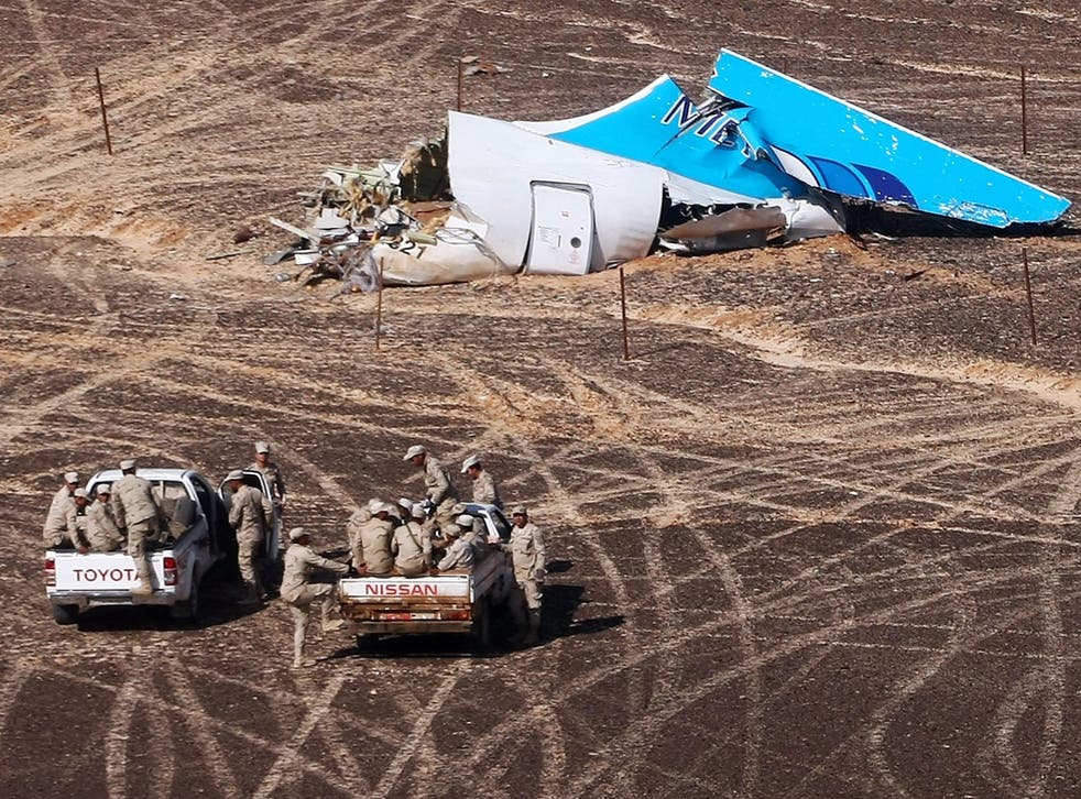 A handout picture taken on November 1, 2015 and released on November 3, 2015 by Russia's Emergency Ministry shows the wreckage of a A321 Russian airliner in Wadi al-Zolomat, a mountainous area of Egypt's Sinai Peninsula
