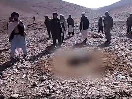 &#13;
A still from an Isis video purportedly showing a woman being stoned&#13;