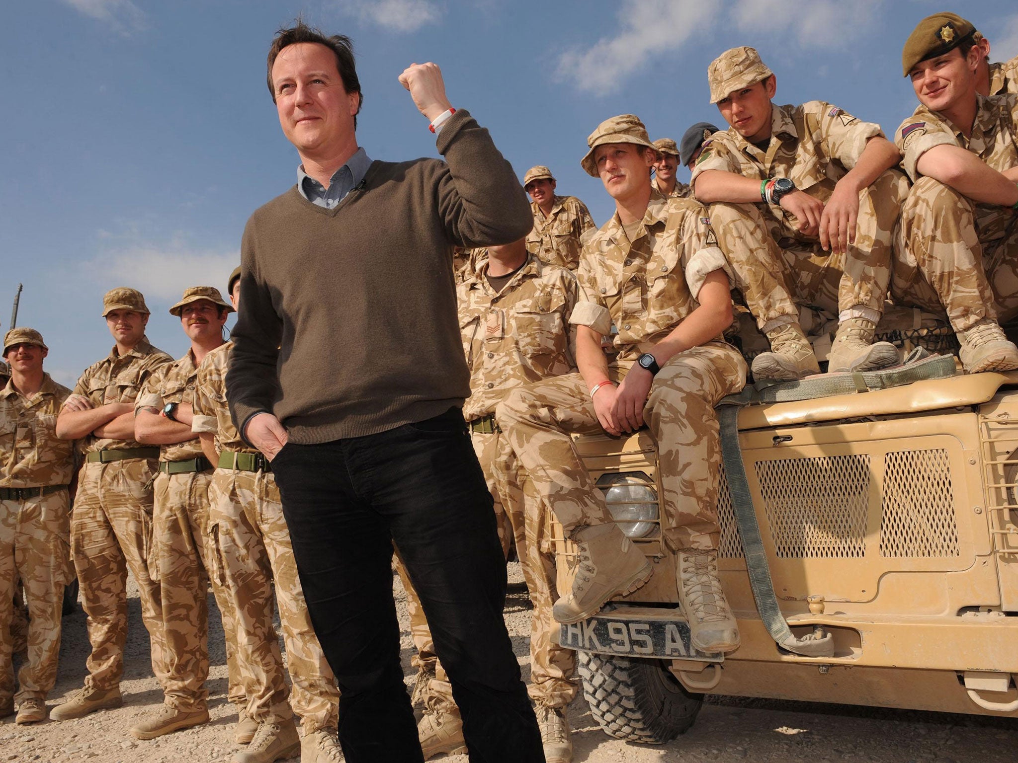 File: David Cameron meets British soldiers at the Task Force Helmand HQ in Lashkar Gah, Afghanistan in 2009