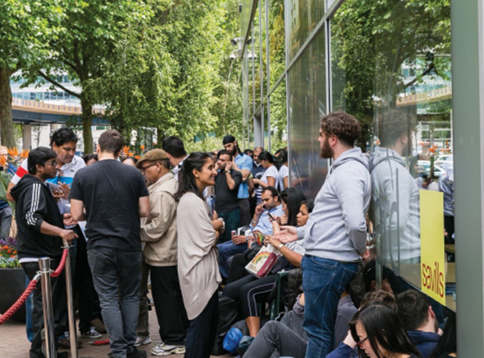 First time buyers queue for properties at a previous Galliard launch in Canary Wharf