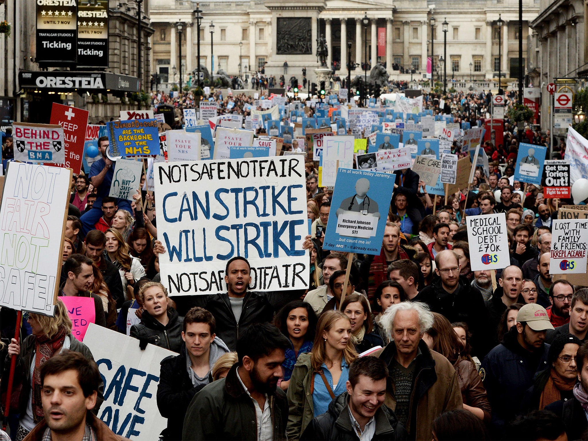 Demonstrators march down Whitehall during the 'Let's Save the NHS' protest by junior doctors in London last month