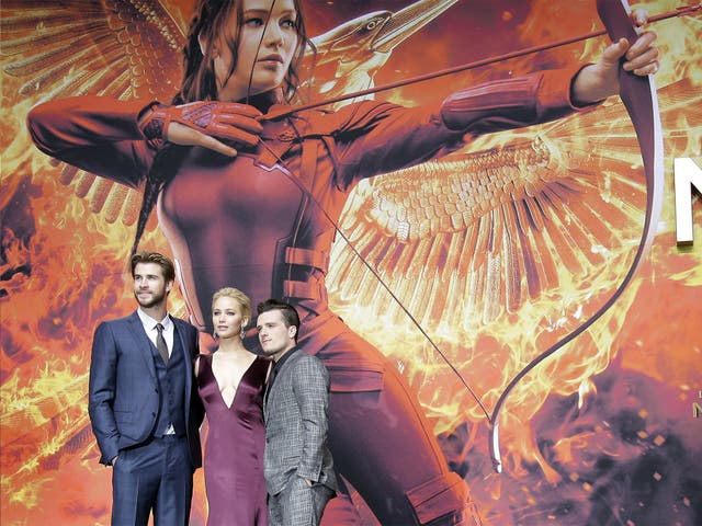 Liam Hemsworth, Jennifer Lawrence, and Josh Hutcherson at the Berlin premiere on Wednesday night