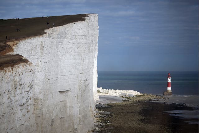 Beachy Head and other cliffs in East Sussex have suffered from protection being given to areas further west, as well as bigger waves caused by climate change, researchers say