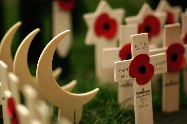 Wooden crescents represent Muslim soldiers in Westminster Abbey's Royal British Legion Poppy Factory Field of Remembrance. The crescent of Islam doesn't allow other symbols to be attached to it.