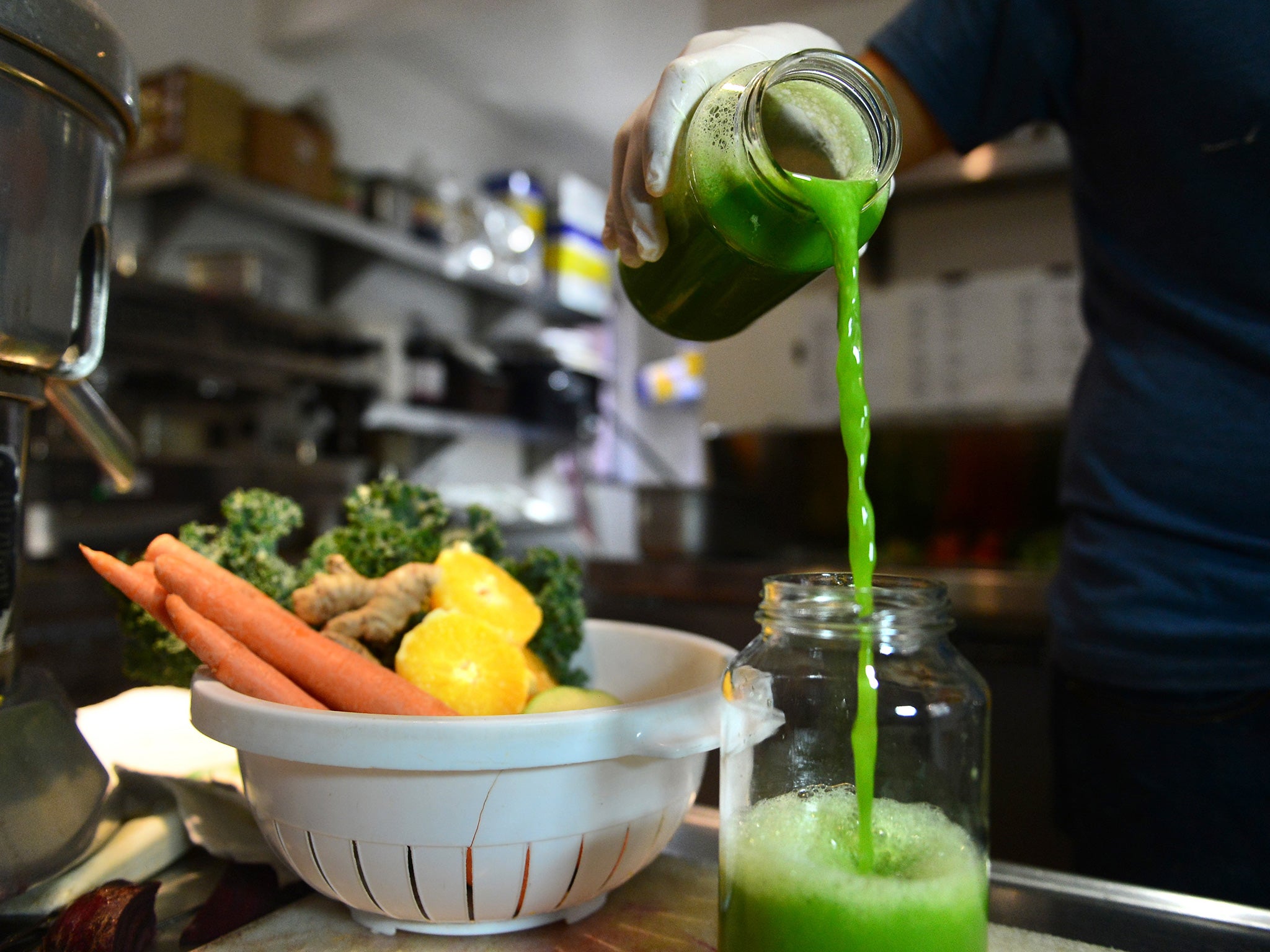 A Kale smoothie is created in a juice bar in Silver Lake, Los Angeles
