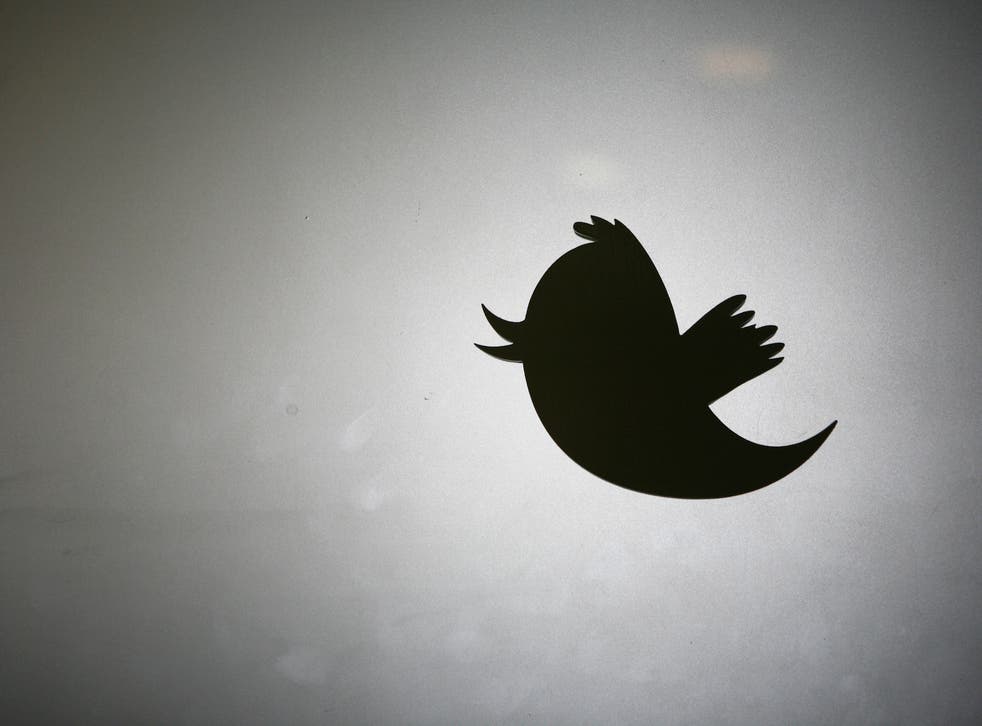 Twitter logo is displayed at San Francisco headquarters in California.