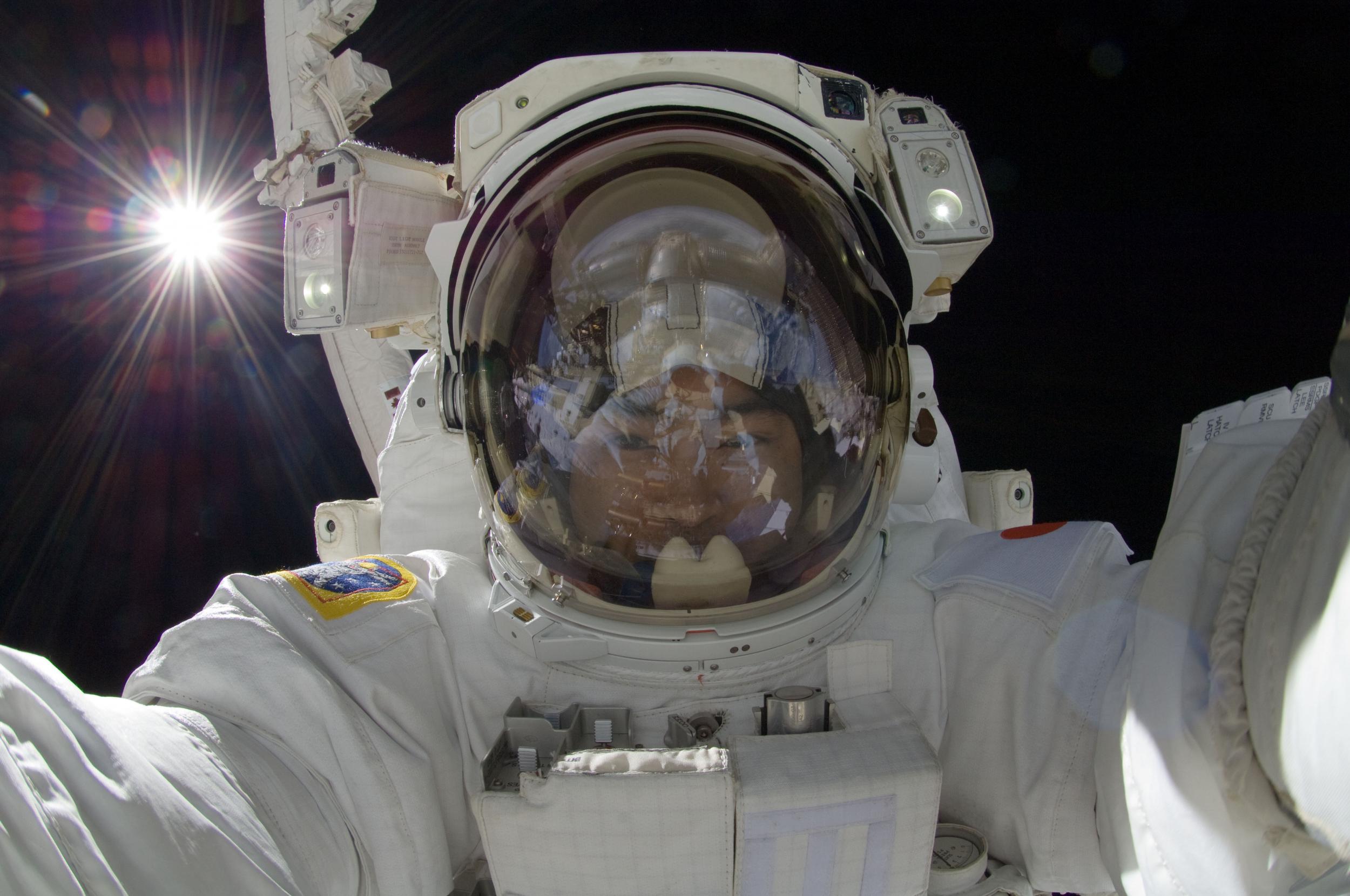Japanese astronaut Aki Hoshide takes a selfie in space