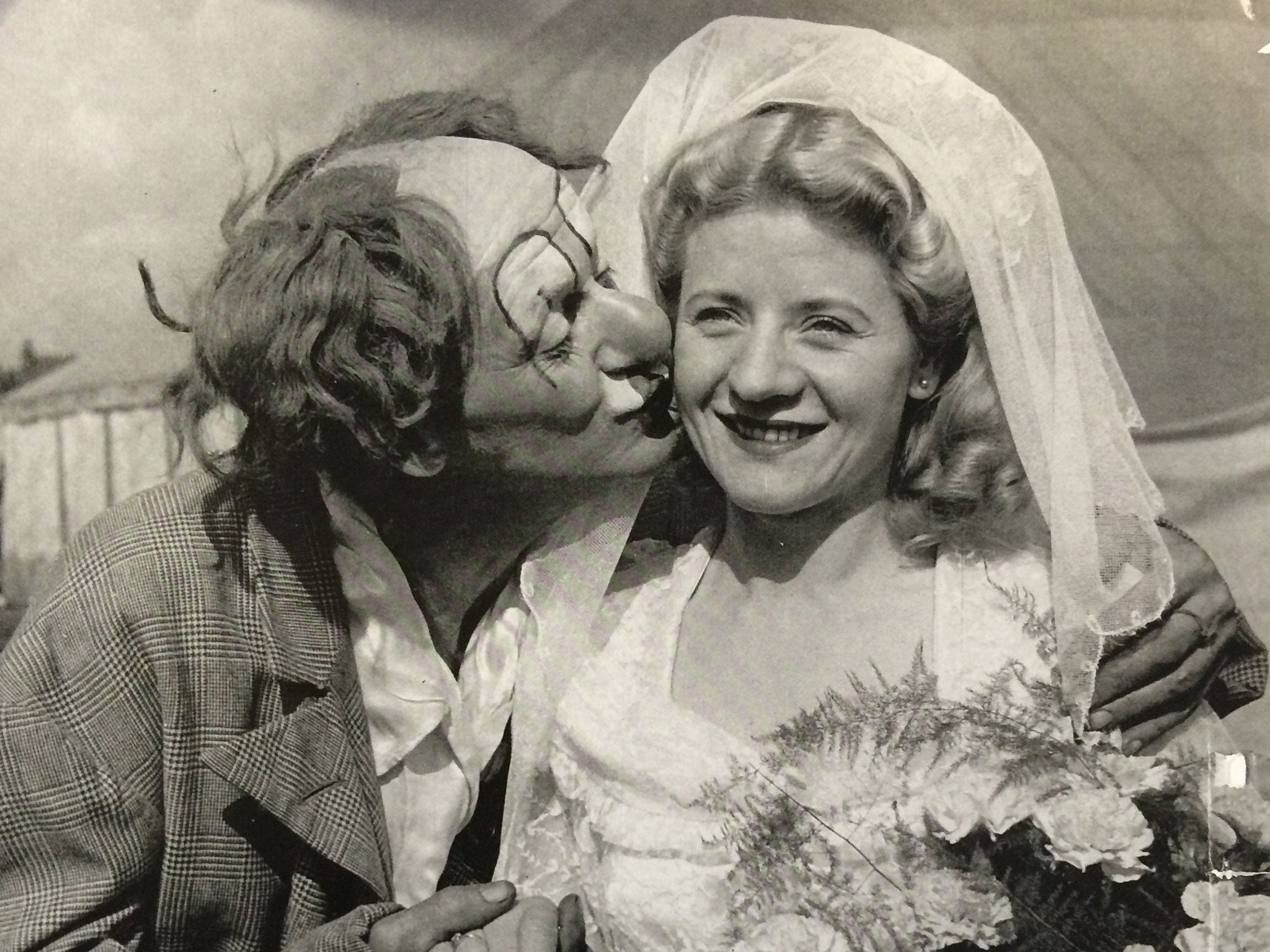 Kerr on her wedding day with her father Nicolai Poliakoff, aka Coco the Clown