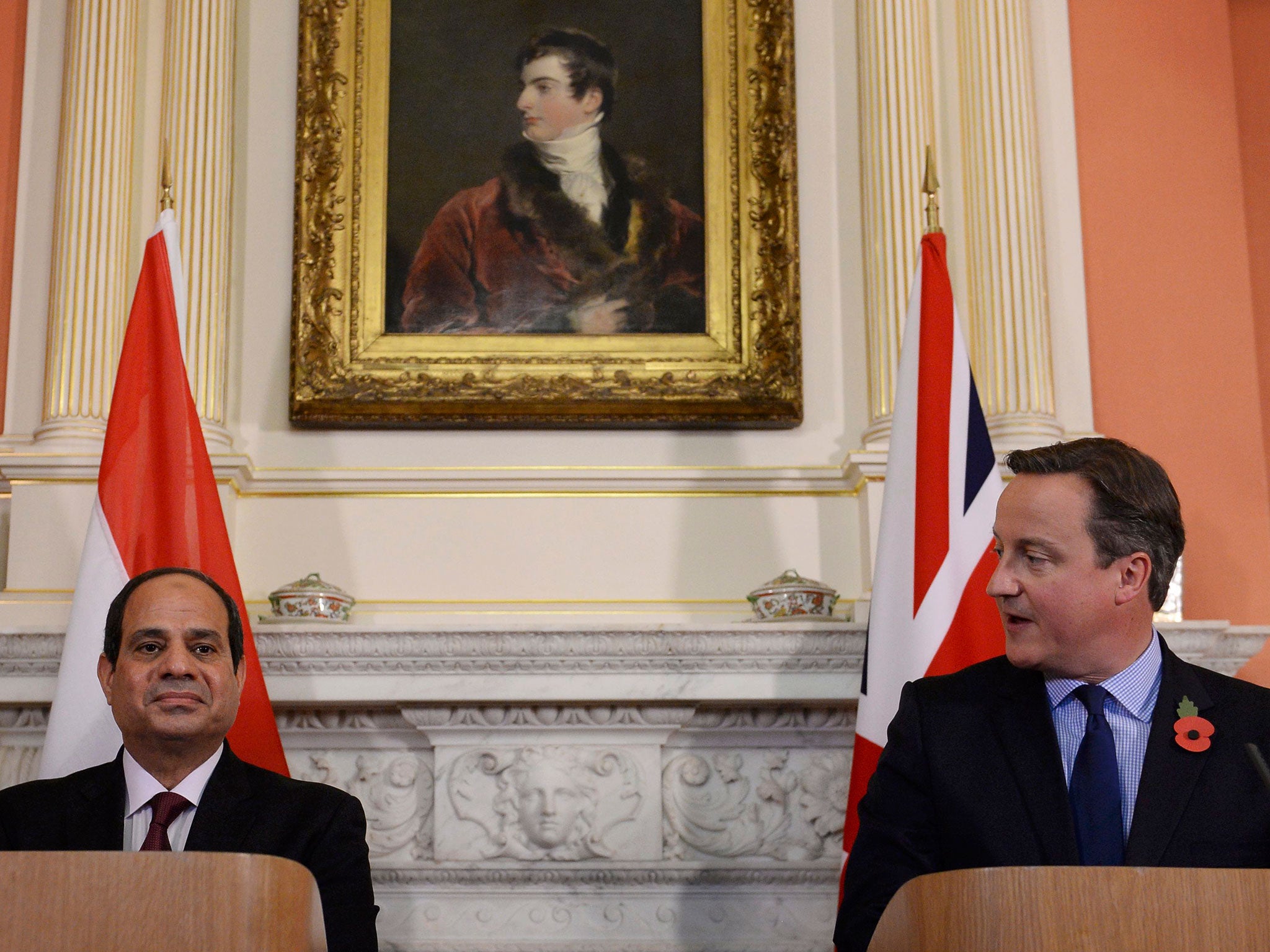 Britain's Prime Minister David Cameron, right, speaks during a news conference with Egypt's President Abdel Fattah al-Sisi at 10 Downing Street