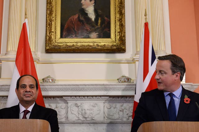 Britain's Prime Minister David Cameron, right, speaks during a news conference with Egypt's President Abdel Fattah al-Sisi at 10 Downing Street