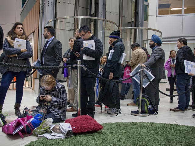 Prospective buyers queue at the development in Hounslow, west London