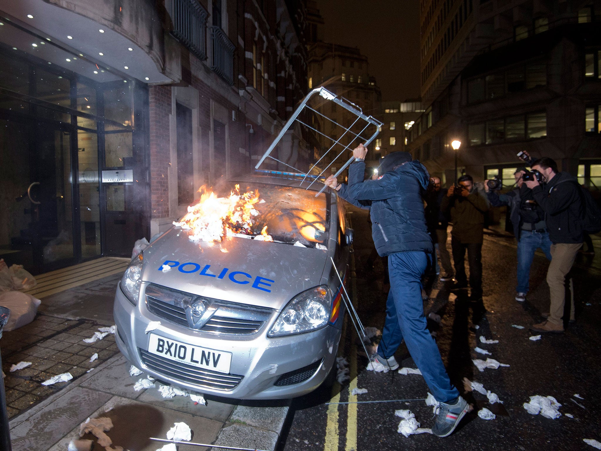 A burning police car