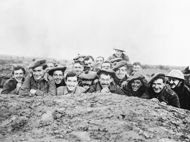 Gordon Highlanders smile for the camera from a reserve trench, 1916