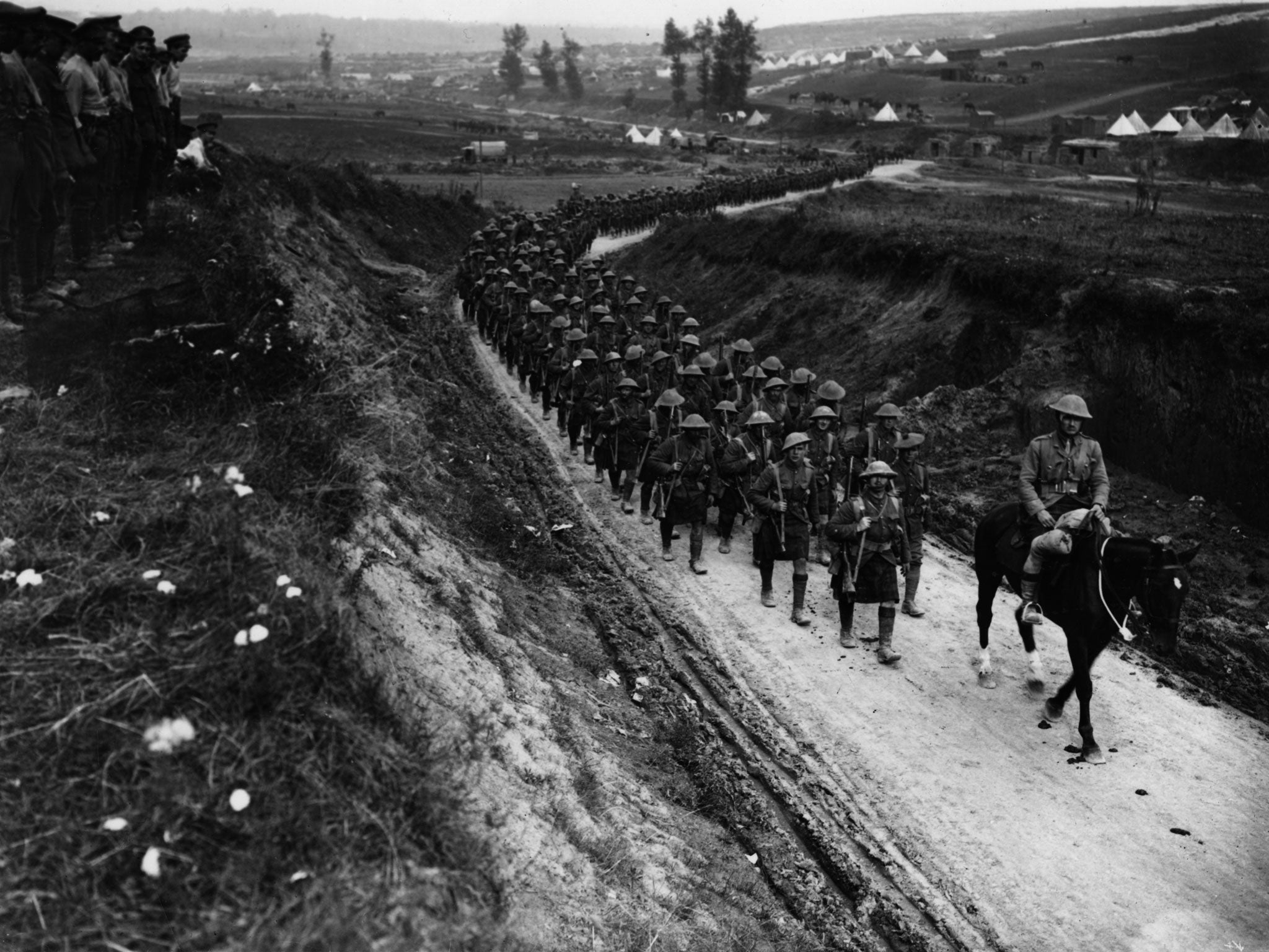 A battalion of the Gordon Highlanders marches towards the Somme trenches