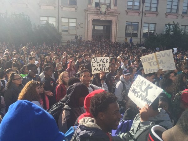 Students chant 'We got that unity!' and 'Say it loud, I’m black and I’m proud!' as they march through downtown to University of California, Berkeley