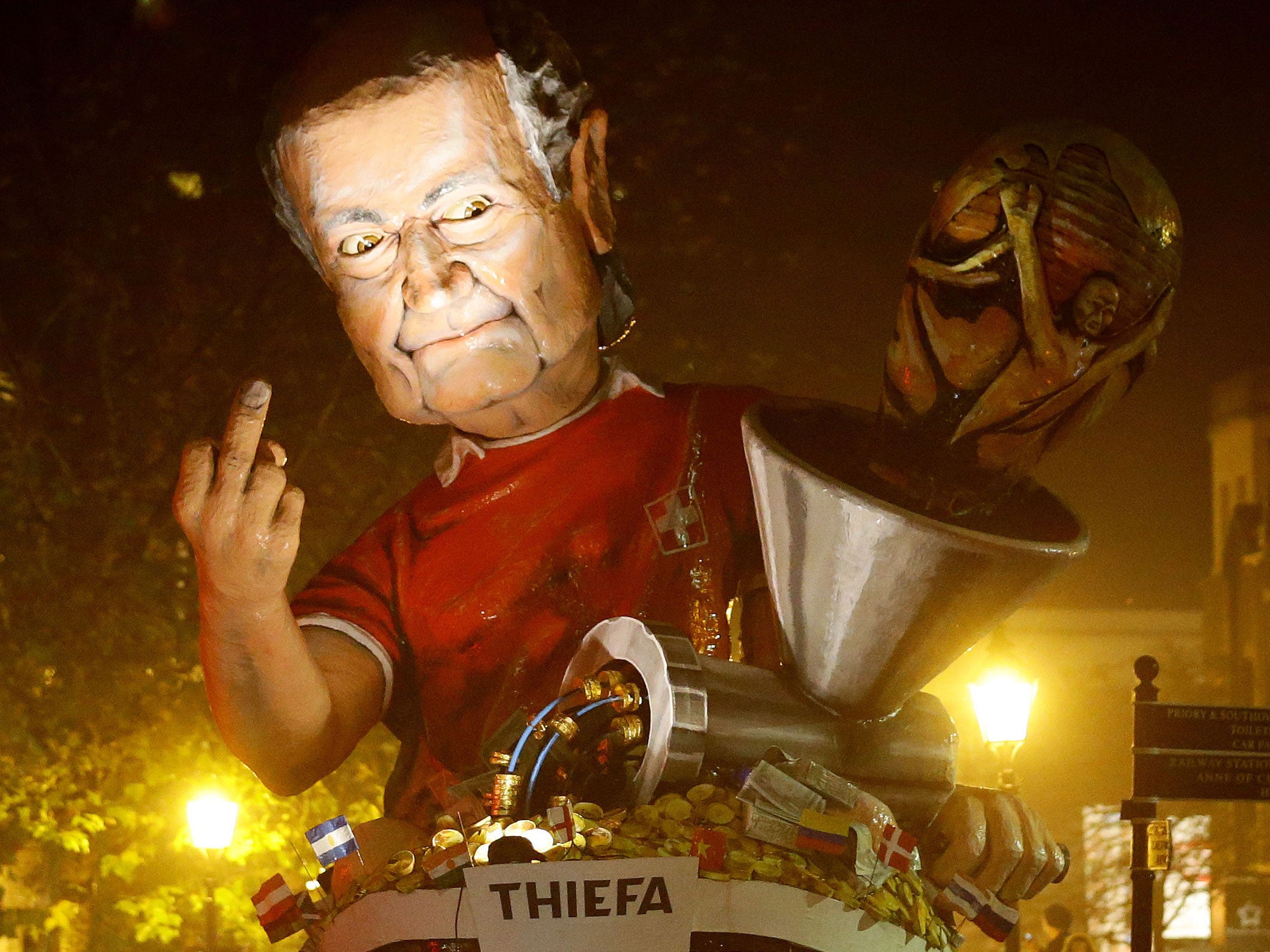 An effigy of Sepp Blatter is paraded through the town of Lewes PA