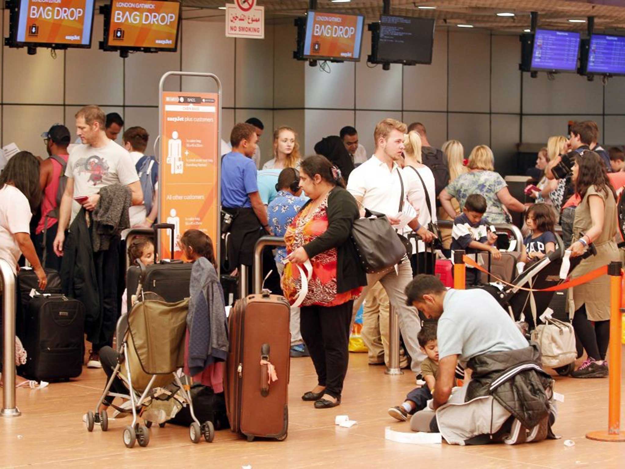Passengers at Sharm el-Sheikh airport await information on their flights