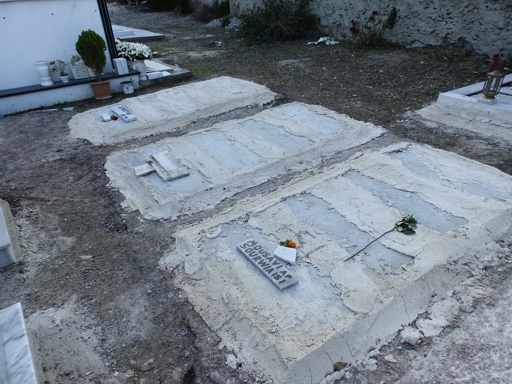 The bodies of Christian refugees are buried separately from Muslim refugees at the Agios Panteleimonas cemetery in Mytilene, Lesbos.