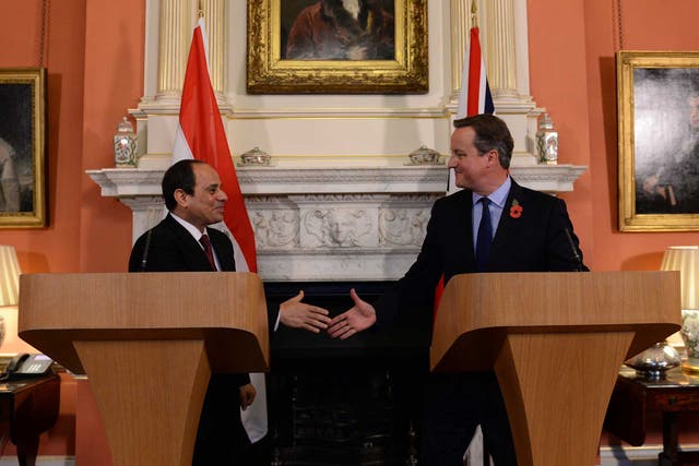 David Cameron shakes hands with Sisi during a news conference at 10 Downing Street