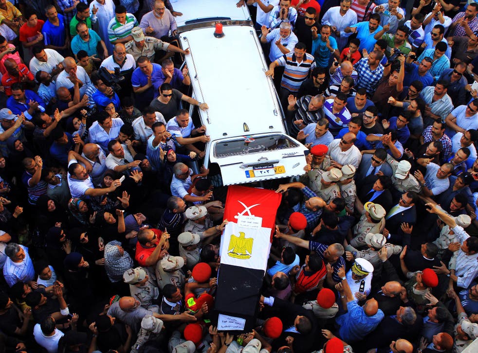 A funeral in the Egyptian town of Sheikh Zuwayed on 2 July, a day after an attack by the Isis affiliate Sinai Province