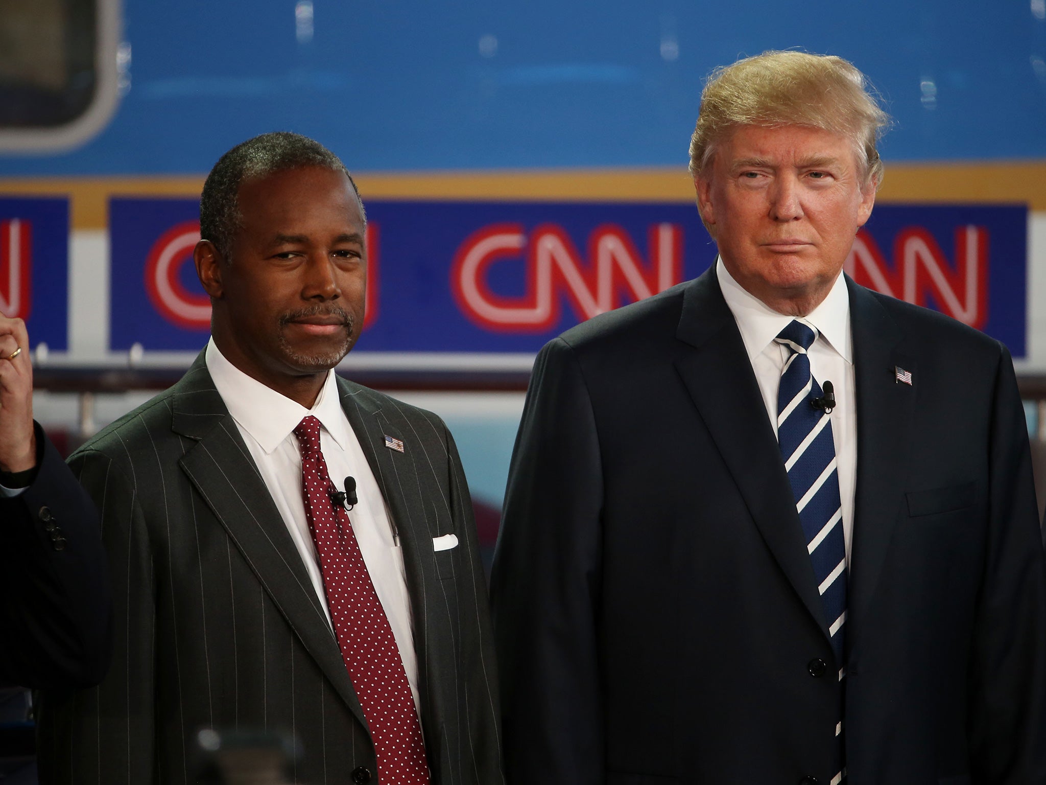 Ben Carson, left, and Donald Trump, lead the Republican race at 26 and 23 per cent respectively