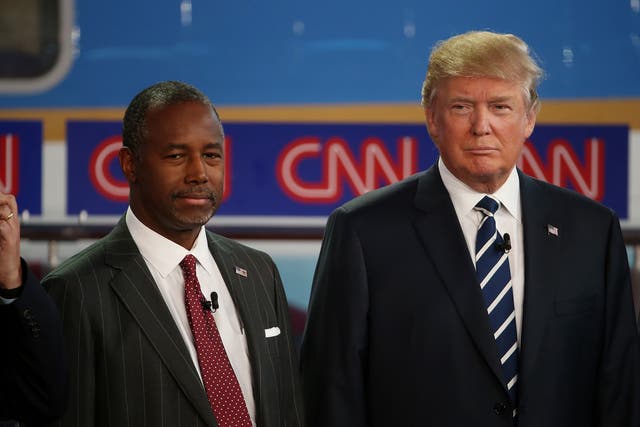 Ben Carson, left, and Donald Trump, lead the Republican race at 26 and 23 per cent respectively