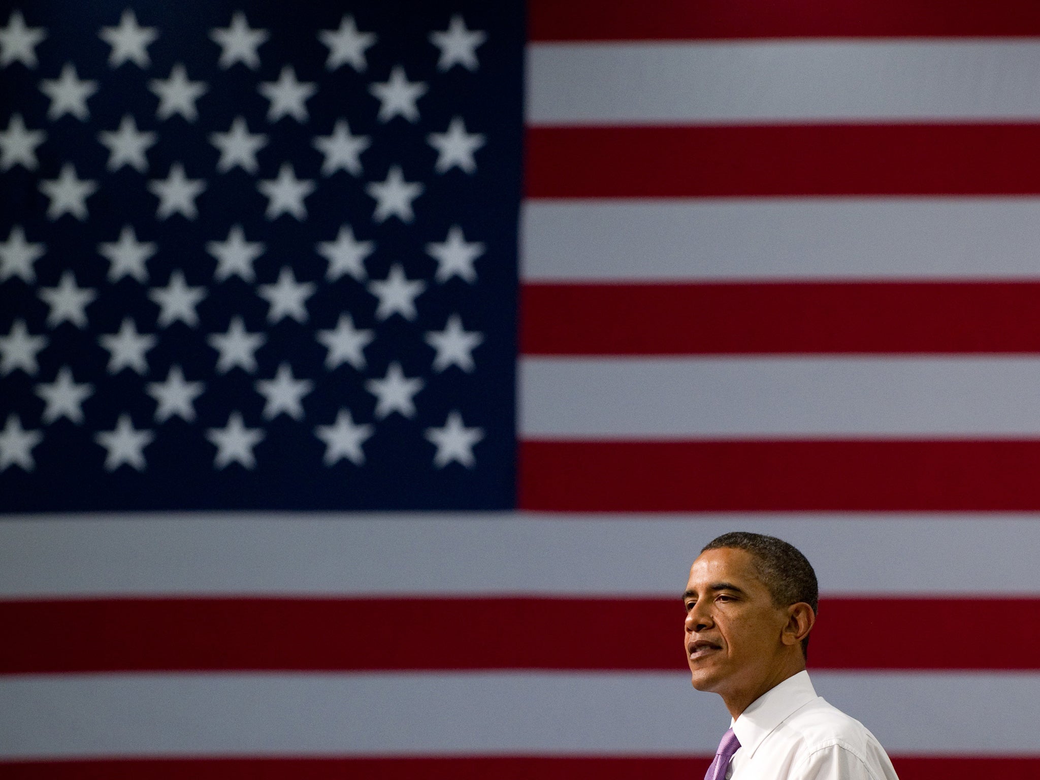 US President Barack Obama speaks on the economy and job creation at Smith Electric Vehicles in Kansas City