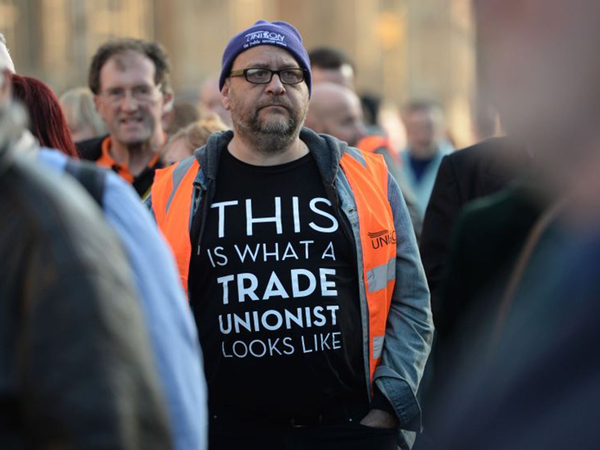 TUC members queue outside the Houses of Parliament to lobby against the Trade Union Bill